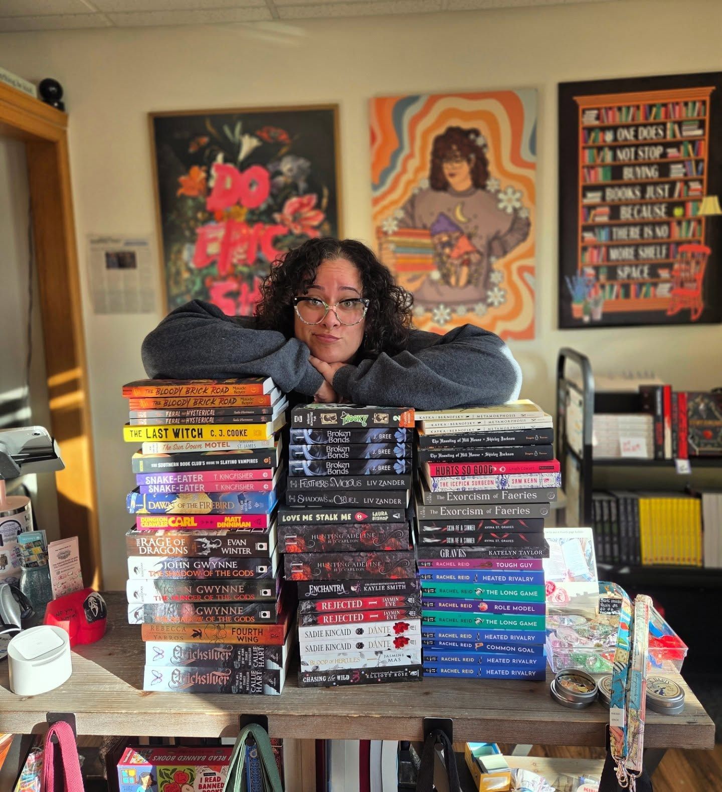 Anne Zastrow behind a stack of books at The Yakima Book Co
